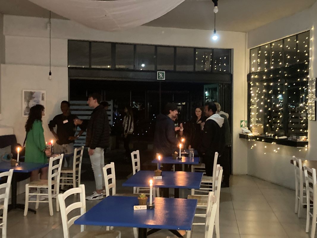 Evening social event with fairy lights and candles