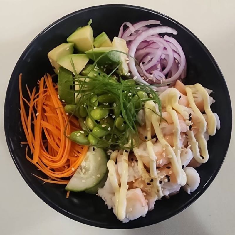 Prawn poke bowl with edamame, avocado, carrot and pickled onion