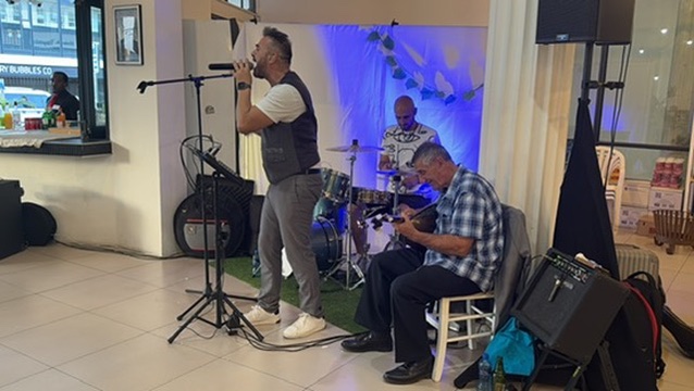 Greek singer and bouzouki duo performing live