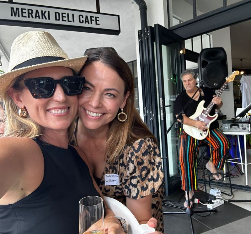Guests at a social event with live music