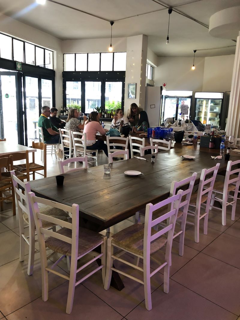 Long communal table set up for a group booking